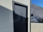 Szigetelt garázs hátra lejtő tetővel, szendvicspanelből 6m x 5.8m
