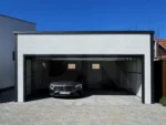 Szigetelt garázs hátra lejtő tetővel, szendvicspanelből 6m x 5.8m