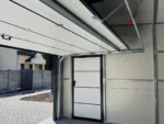 Szigetelt garázs hátra lejtő tetővel, szendvicspanelből 6m x 5.8m