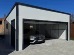 Szigetelt garázs hátra lejtő tetővel, szendvicspanelből 6m x 5.8m