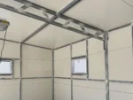 Szigetelt garázs hátra lejtő tetővel, szendvicspanelből 6m x 5.8m