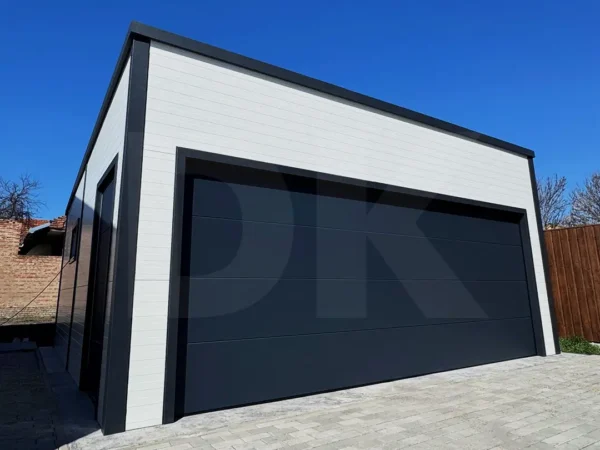 Szigetelt garázs hátra lejtő tetővel, szendvicspanelből 6m x 5.8m