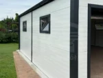 Modern szigetelt szendvicspanel garázs nyeregtetővel 6m x 5.8m