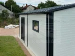 Modern szigetelt szendvicspanel garázs nyeregtetővel 6m x 5.8m